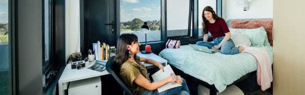 Students interacting in a room