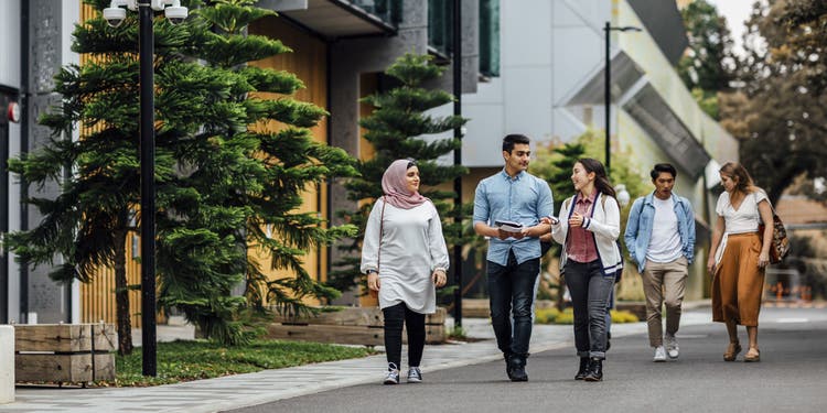 students walking together on campus