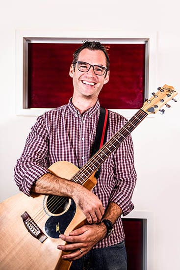 Andrew Bucknall with guitar