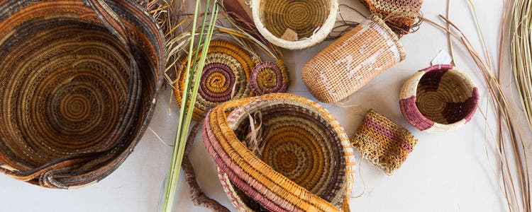 Photo of baskets weaved using traditional Aboriginal And Torres Strait Islander methods.