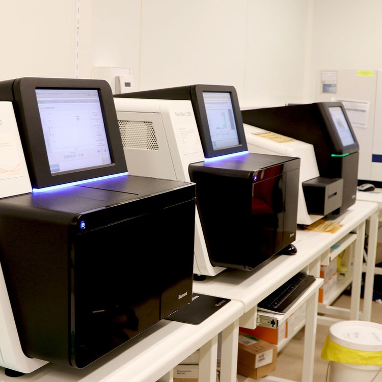 A laboratory with Illumina NextSeq 500 machines for sequencing.