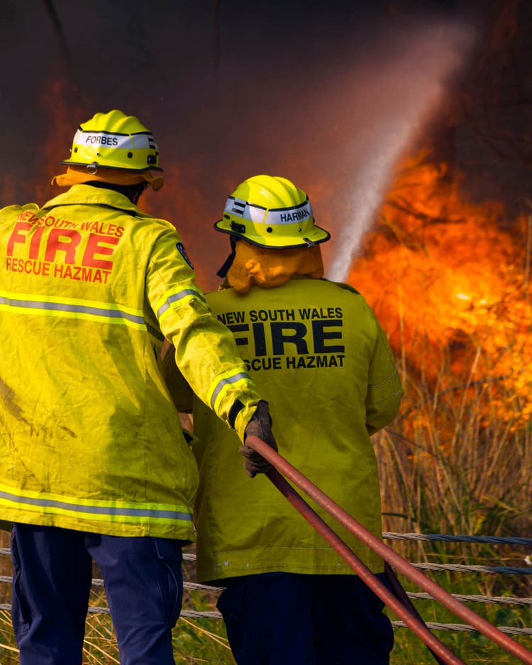 Fire fighters battling bush fire