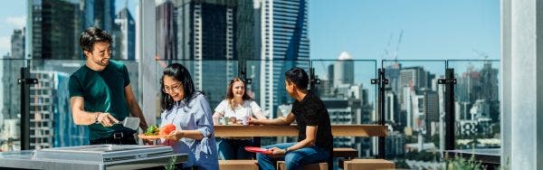 Students interacting on a rooftop