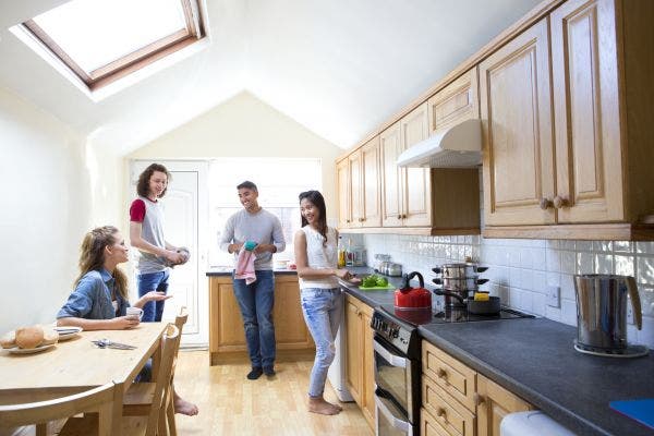 People in a share house in the kitchen