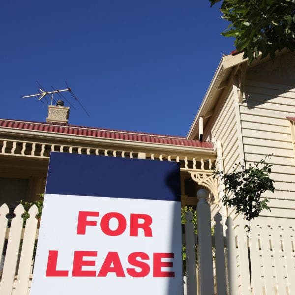 House with a for lease sign