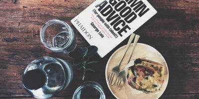 Book and food on table