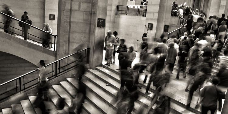 People walking up and down stairs