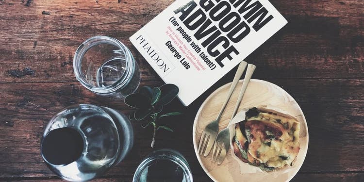 Book and food on table