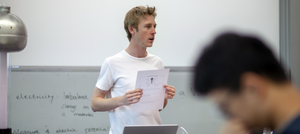 University teacher delivers a class lecture