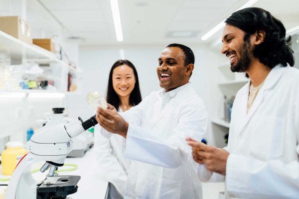 Two students working in food lab
