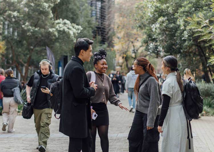 Students talking to each other at Melbourne Connect.