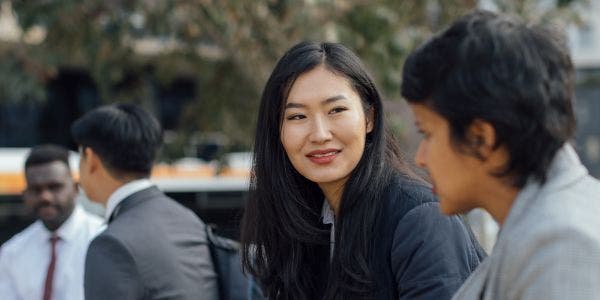 Mature-age students and working professionals sitting together outside