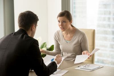woman negotiating in a meeting